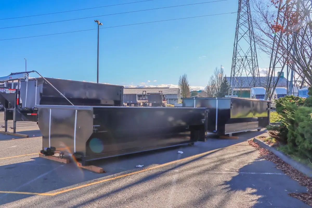 Roll-off dumpster ready for waste disposal at job site for Roofing Dumpster Rental in Woodbridge
